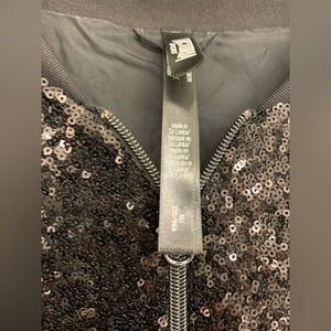 Selling a Victoria’s Secret Sequin black jacket size medium worn once.
